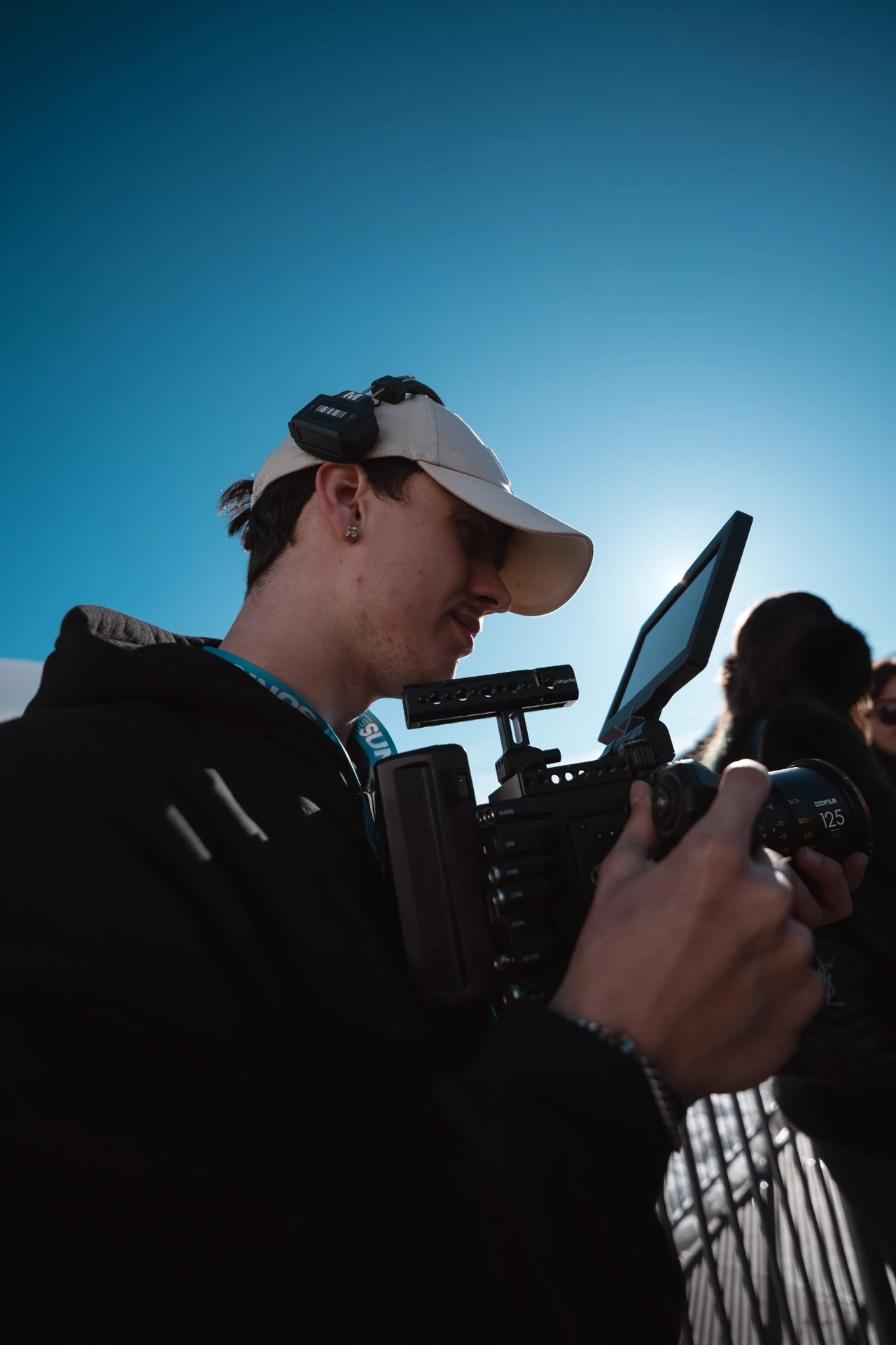 Kieran Steiner operating a cinema camera at SunIce.