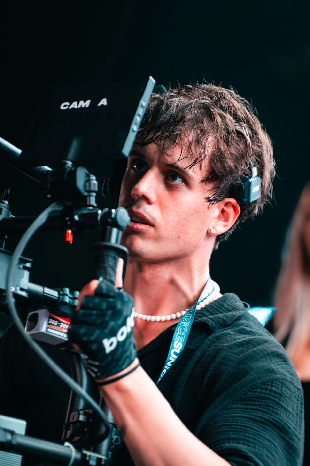 Kieran Steiner operating a camera at SunIce Ascona.