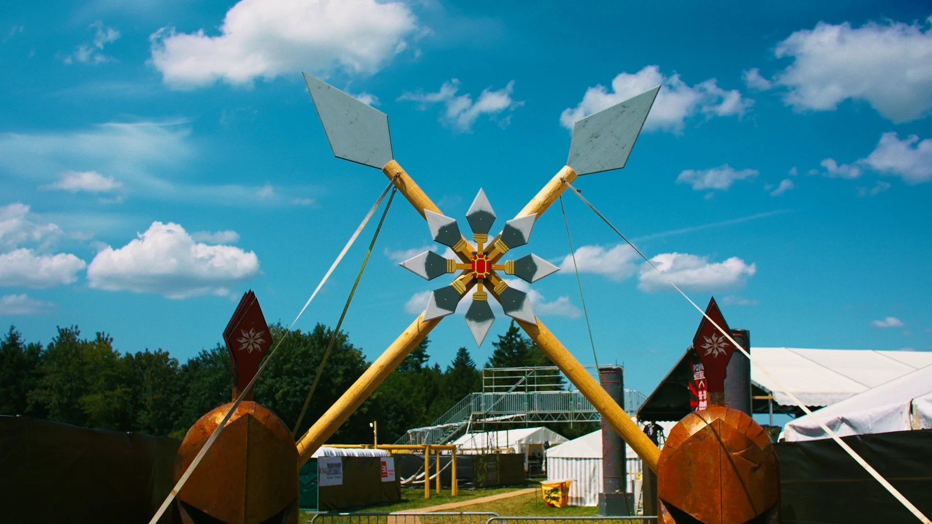 A colourful festival installation at Relevatez under a blue sky.
